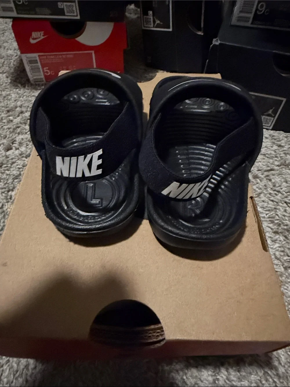 Nike Kids Black Slides with White Swoosh